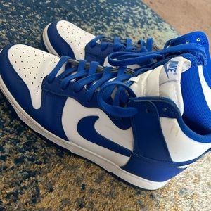 Blue and white high top nike dunks